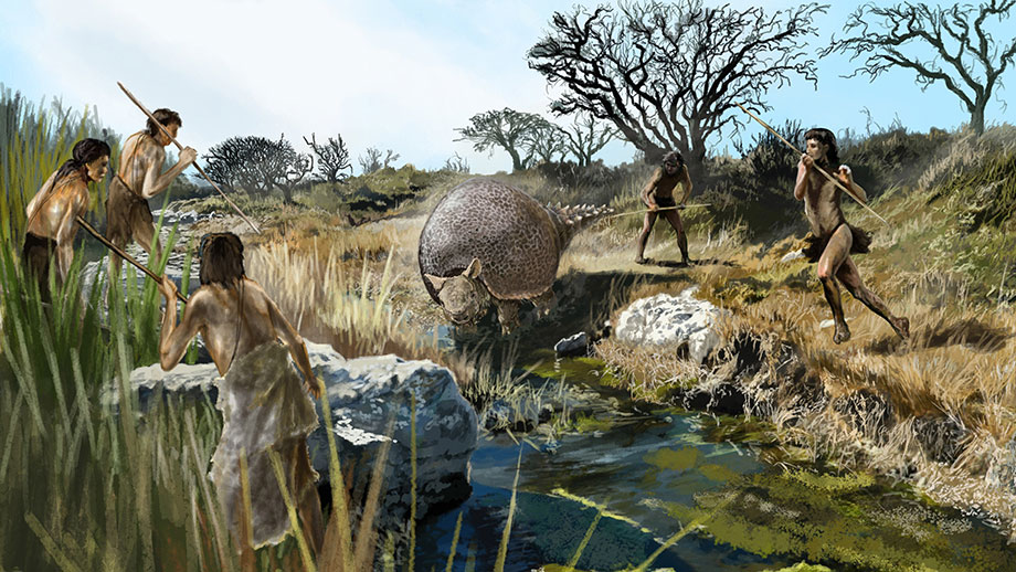 Prähistorische Jäger mit Speeren umzingeln ein Riesengürteltier.