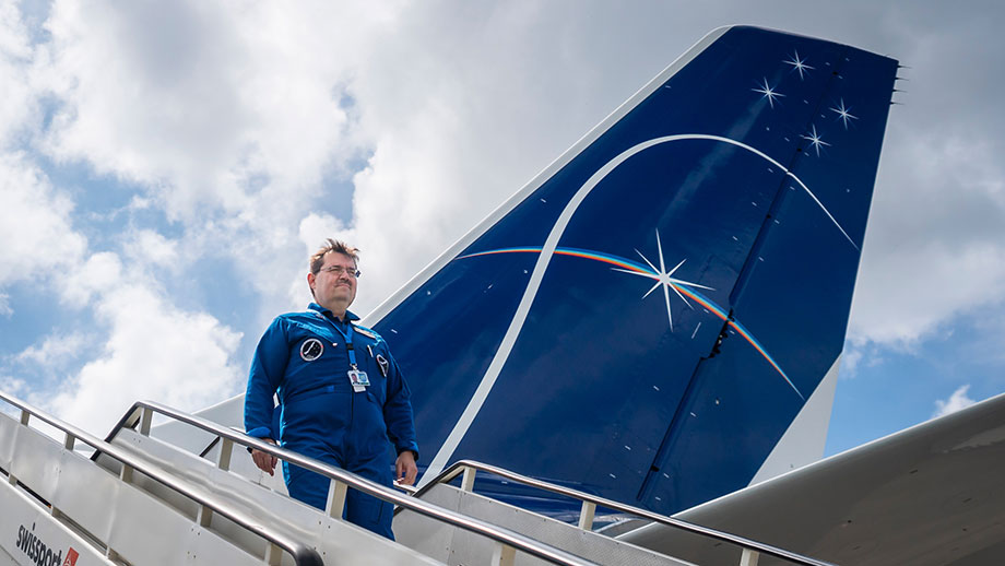 Oliver Ullrich in front of a space shuttle.