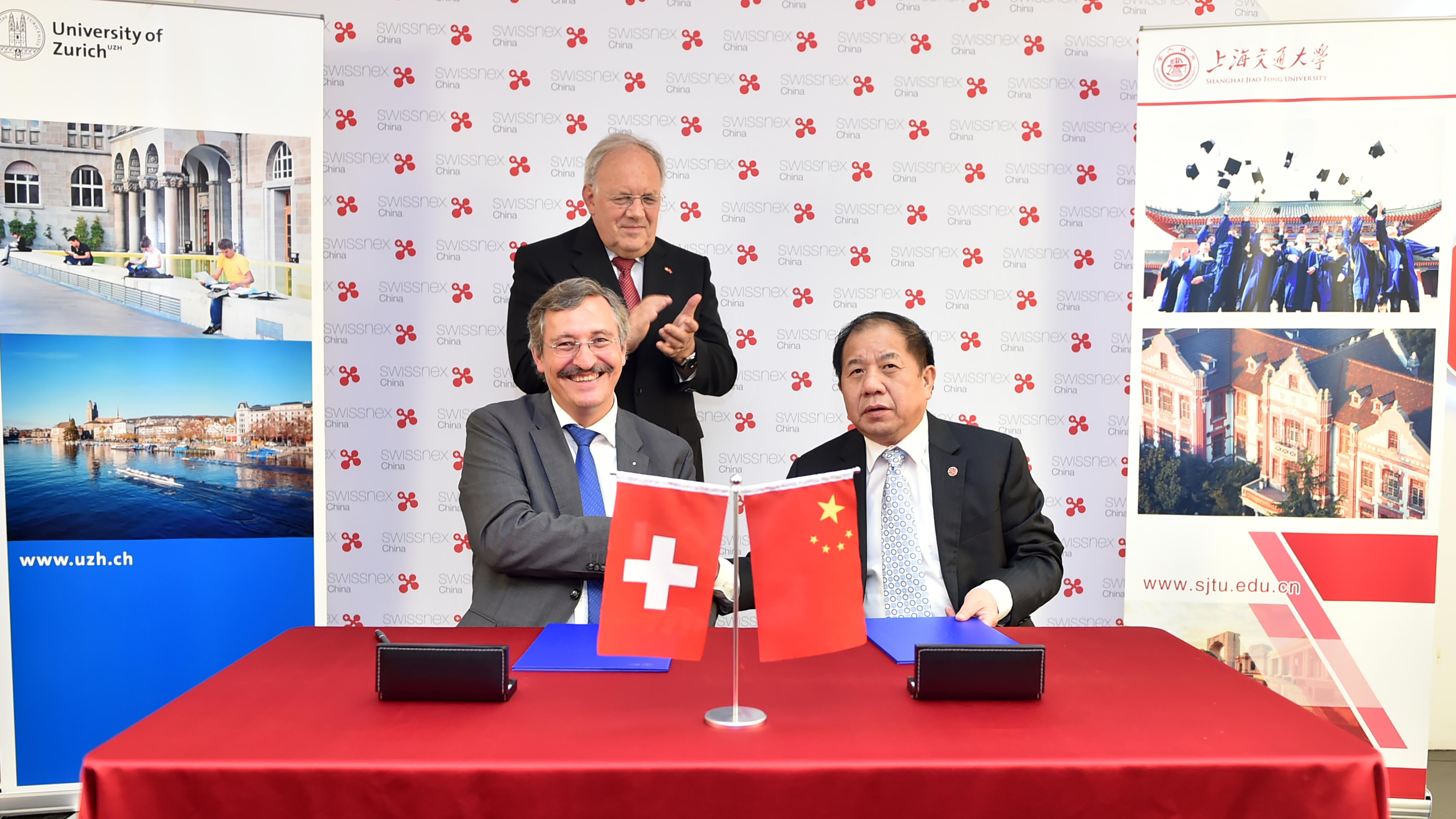 <p>Fostering international relations was one of Michael Hengartner&rsquo;s core goals in his time as president. Here he is pictured with Lin Zhongqin, president of Jiaotong University Shanghai (SJTU), signing an exchange agreement in September 2018. In the background is then federal councilor Johann Schneider-Ammann.</p> (Image: Swissnex China)