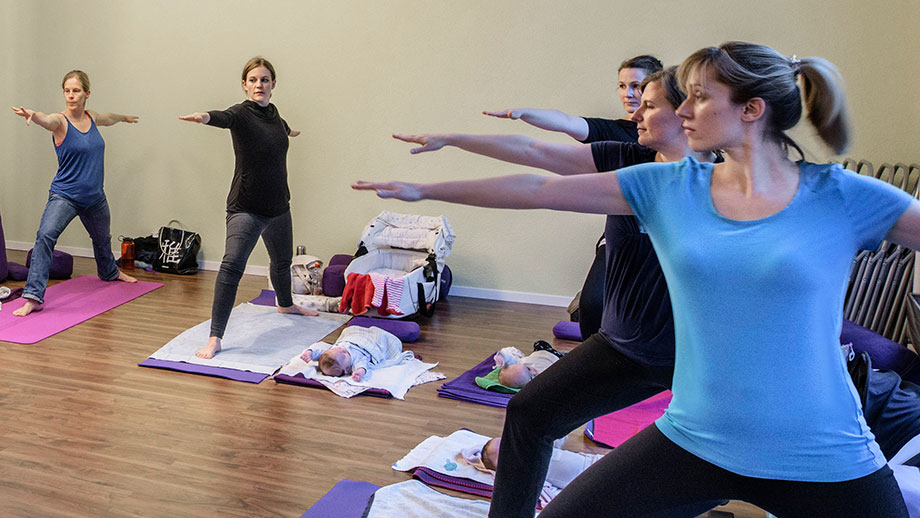 Women training yoga